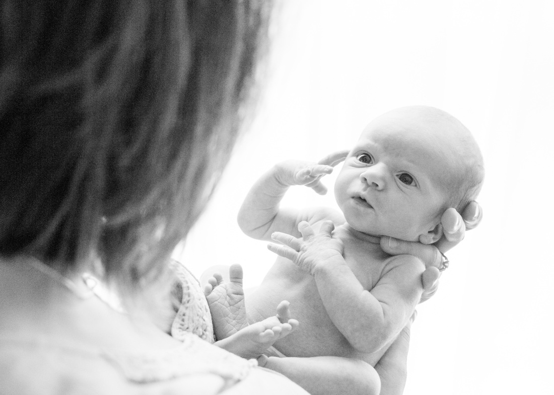 Newborn portraits: Baby in her new, empty house. Photography by Calm Cradle Photo & Design
