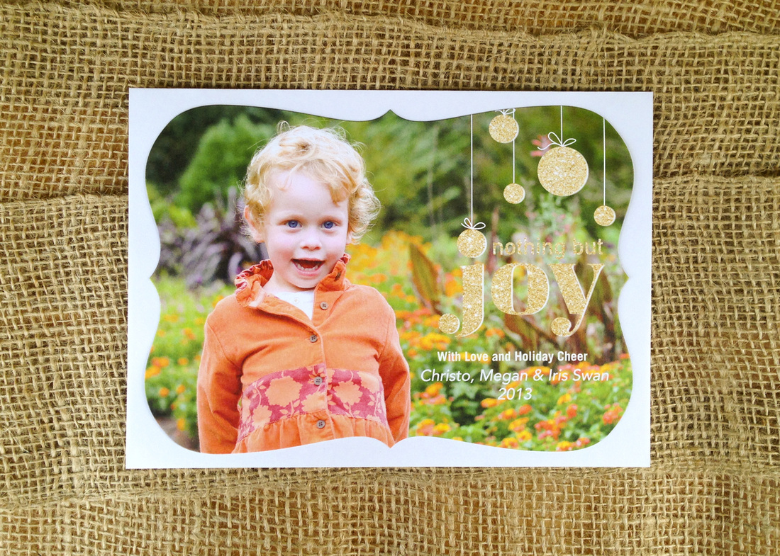 Holiday card portrait: Little girl in orange jacket at Duke Gardens. Photo by Calm Cradle Photo & Design
