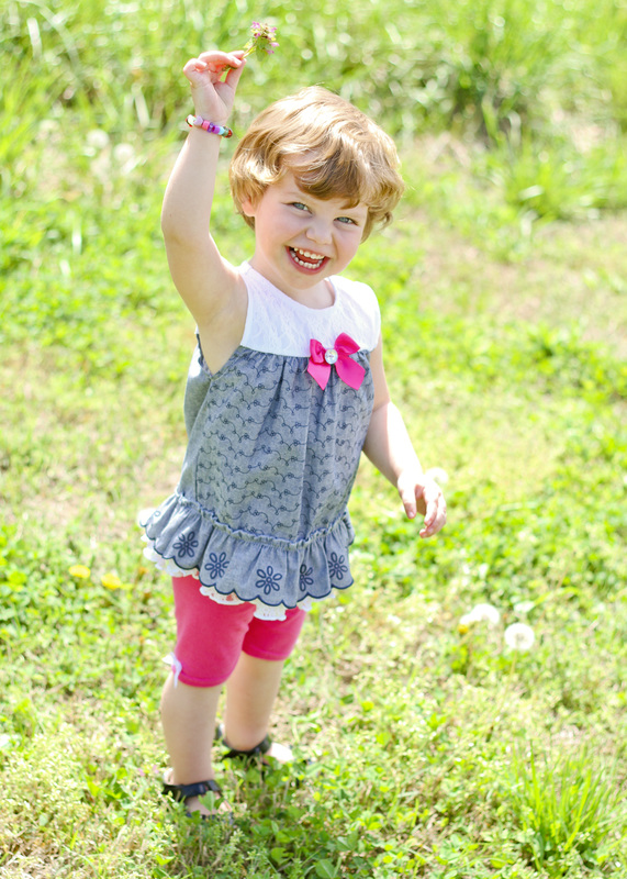Summer portraits: 2-year-old playing with dandelions and azaleas. Photos by Julia Soplop of Calm Cradle Photo & Design