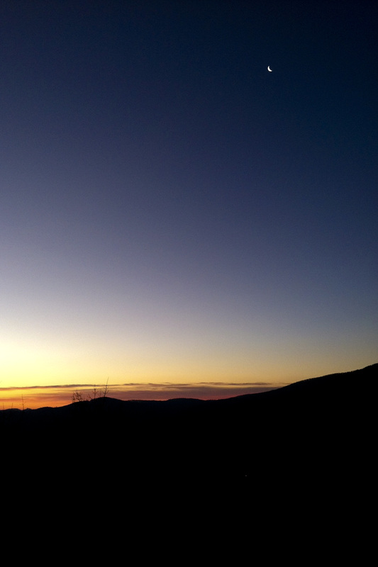 Sunrise over the Blue Ridge Mountains with moon still high in the sky. Calm Cradle Photo & Design