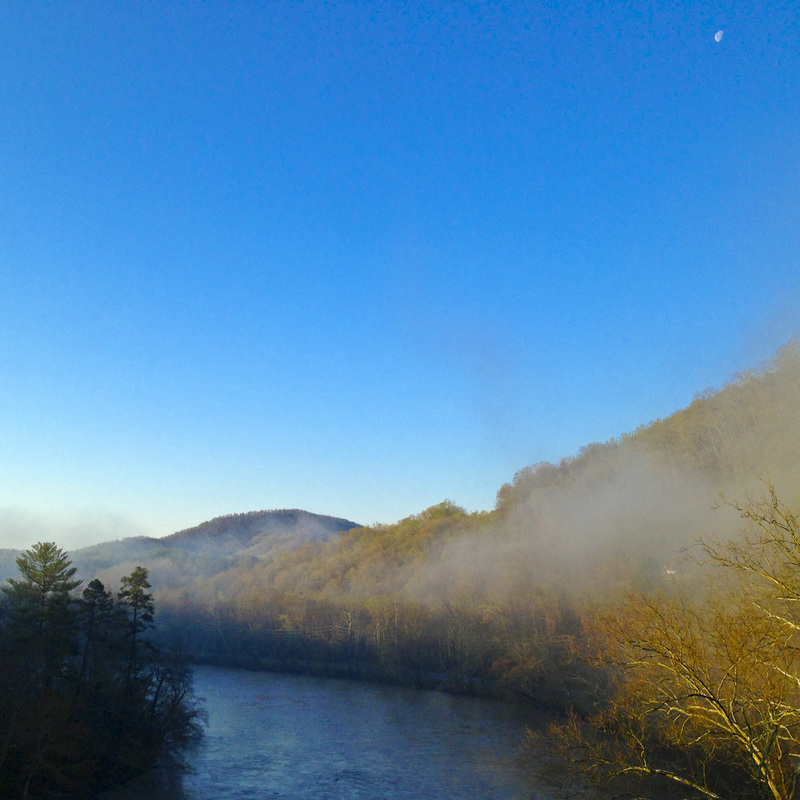French Broad River flowing through Blue Ridge Mountains with moon still in view. Blue Ridge Parkway, Asheville, NC. Julia Soplop/Calm Cradle Photo & Design