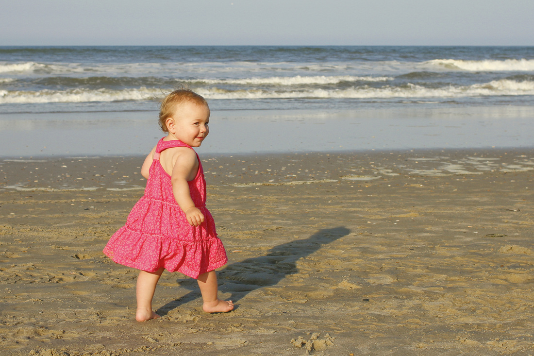 Portraits: Tiny toddler girl at the beach. By Calm Cradle Photo & Design
