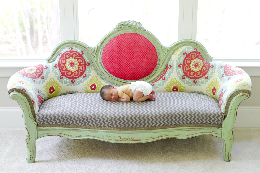 Portraits: Newborn on vintage couch. By Calm Cradle Photo & Design. Chapel Hill, NC. North Carolina lifestyle photography.