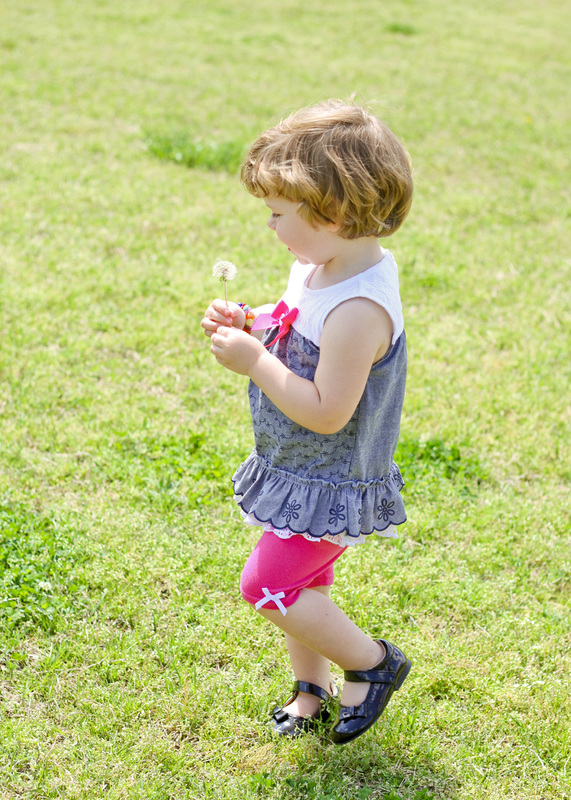 Summer portraits: 2-year-old playing with dandelions and azaleas. Photos by Julia Soplop of Calm Cradle Photo & Design
