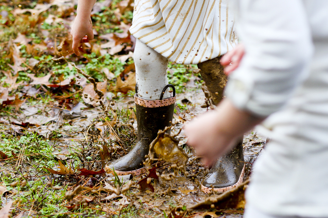 Jumping in the mud. Photography by Julia Soplop/Calm Cradle Photo & Design