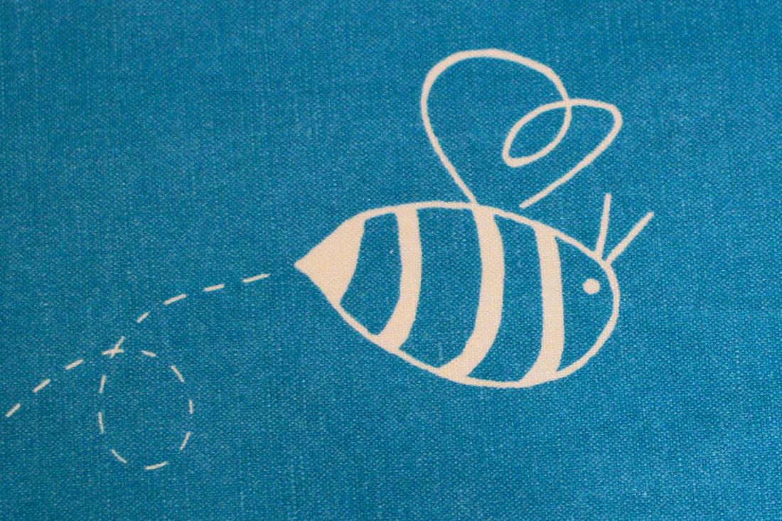 Buzzing bees fabric (in turquoise and custard). By Calm Cradle Photo & Design. Available here: http://www.spoonflower.com/fabric/2162788