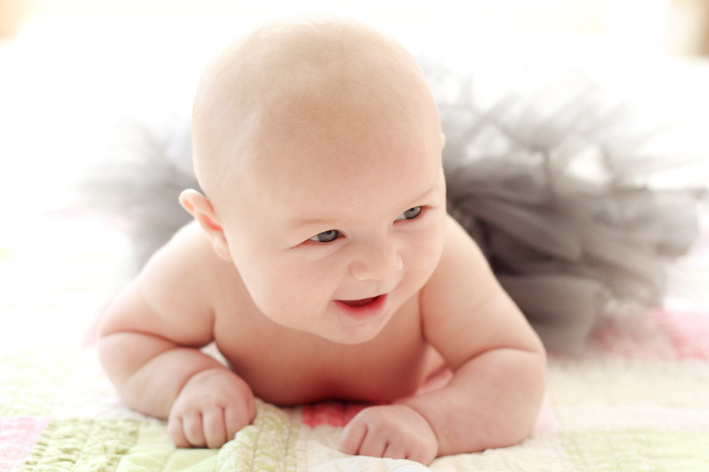 Baby portrait with tutu. Calm Cradle Photo & Design