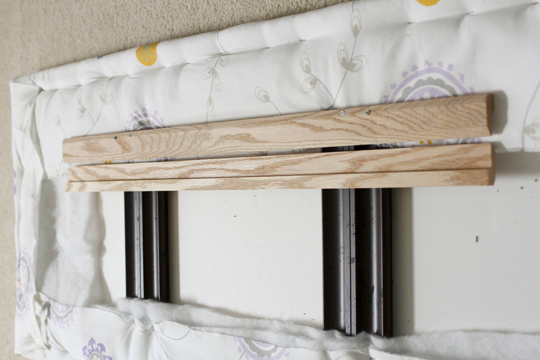 DIY upholstered headboard from upcycled picture frames. Design and photography by Calm Cradle Photo & Design