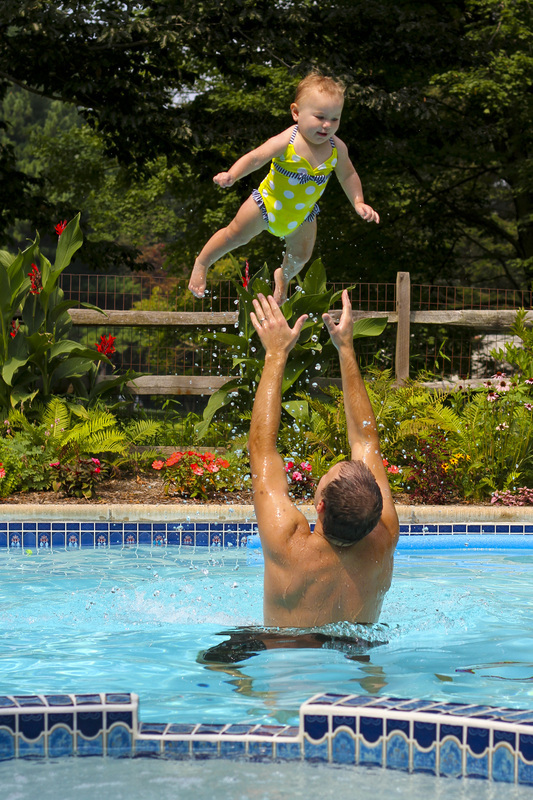 #Fly! Dad throwing baby in the pool. By Calm Cradle Photo & Design