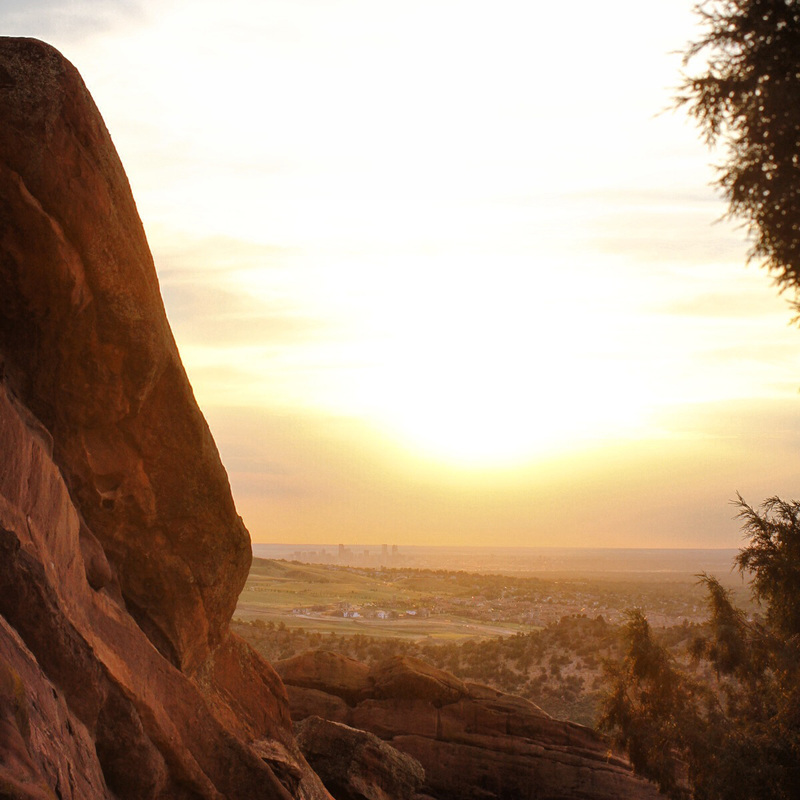 Sunrise over Denver from Red Rocks. By Calm Cradle Photo & Design