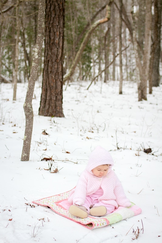 Lifestyle portraits: Baby's first snow at 9 months. By Calm Cradle Photo & Design (Chapel Hill, NC)